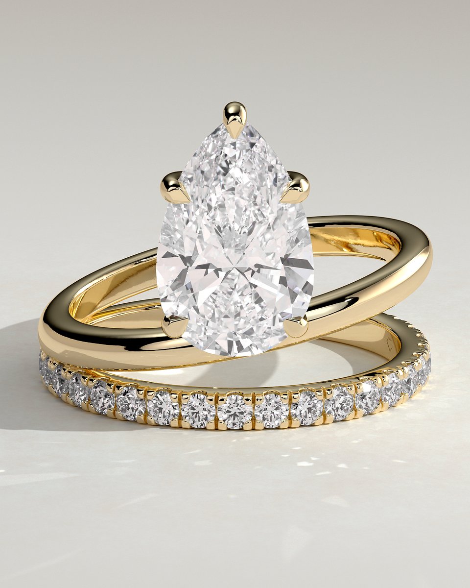 MET 0204 Pear Solitaire Engagement Ring