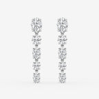 Oval and round diamond drop earrings