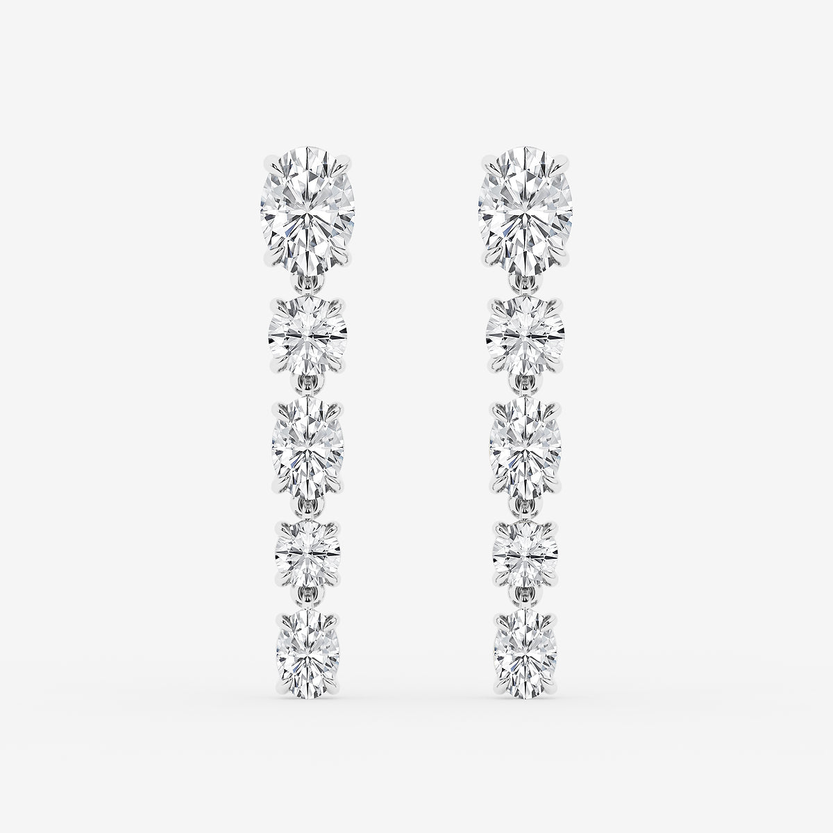 Oval and round diamond drop earrings