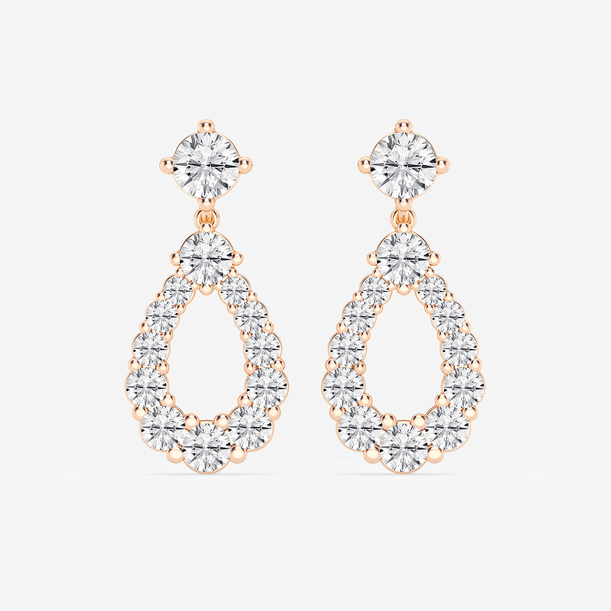 Graduated round diamond drop earrings