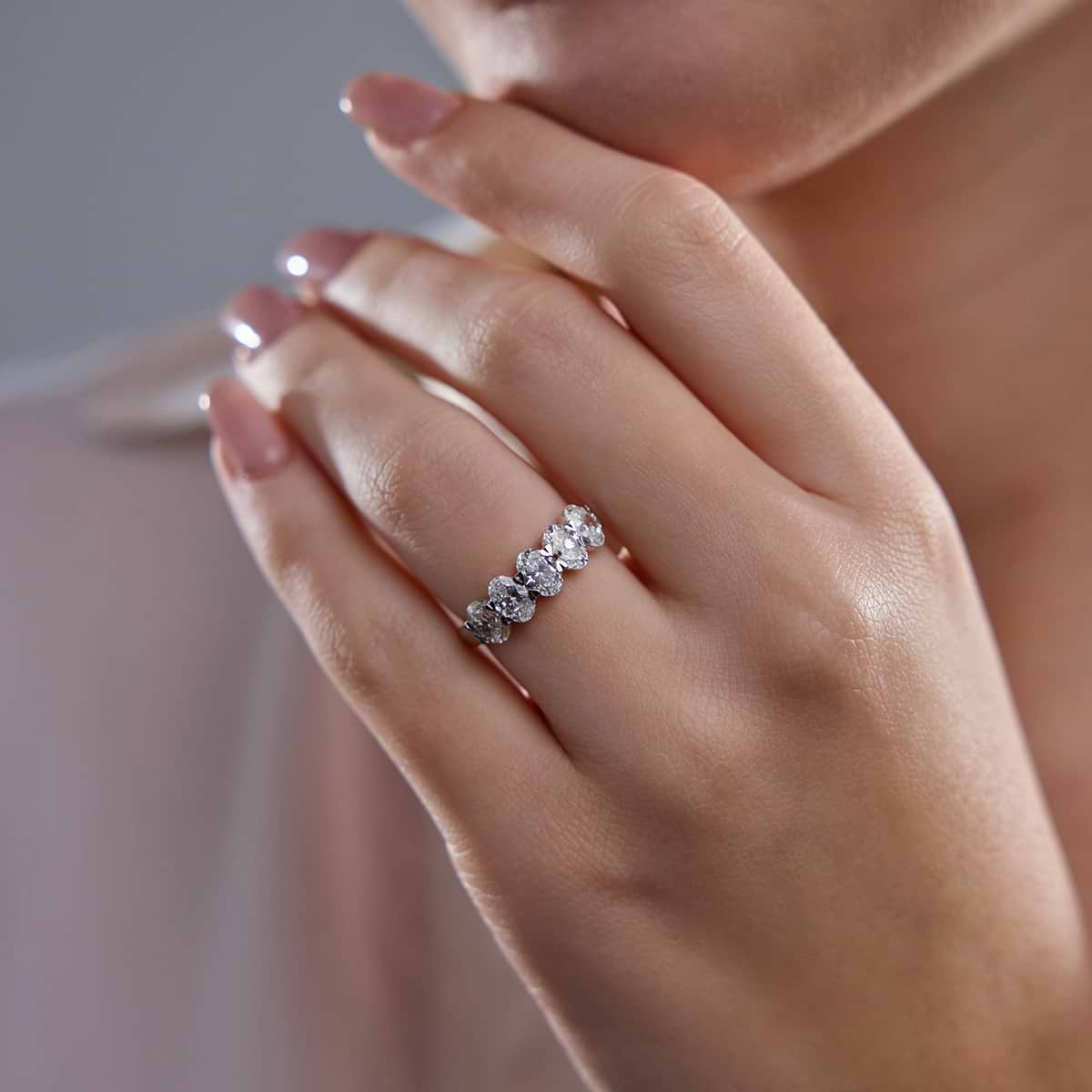 GWA001 oval five-stone band, source-shared on-hand photograph