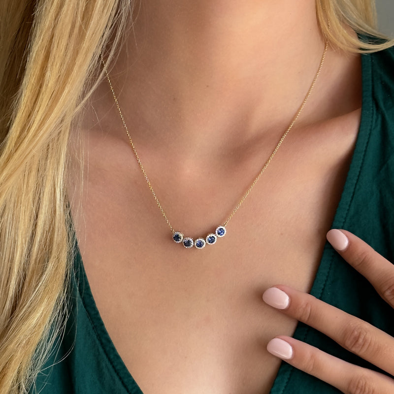 MET-WN-0064 | LGYFN0074 | Yellow gold | Lab Created Sapphire | source lifestyle photo