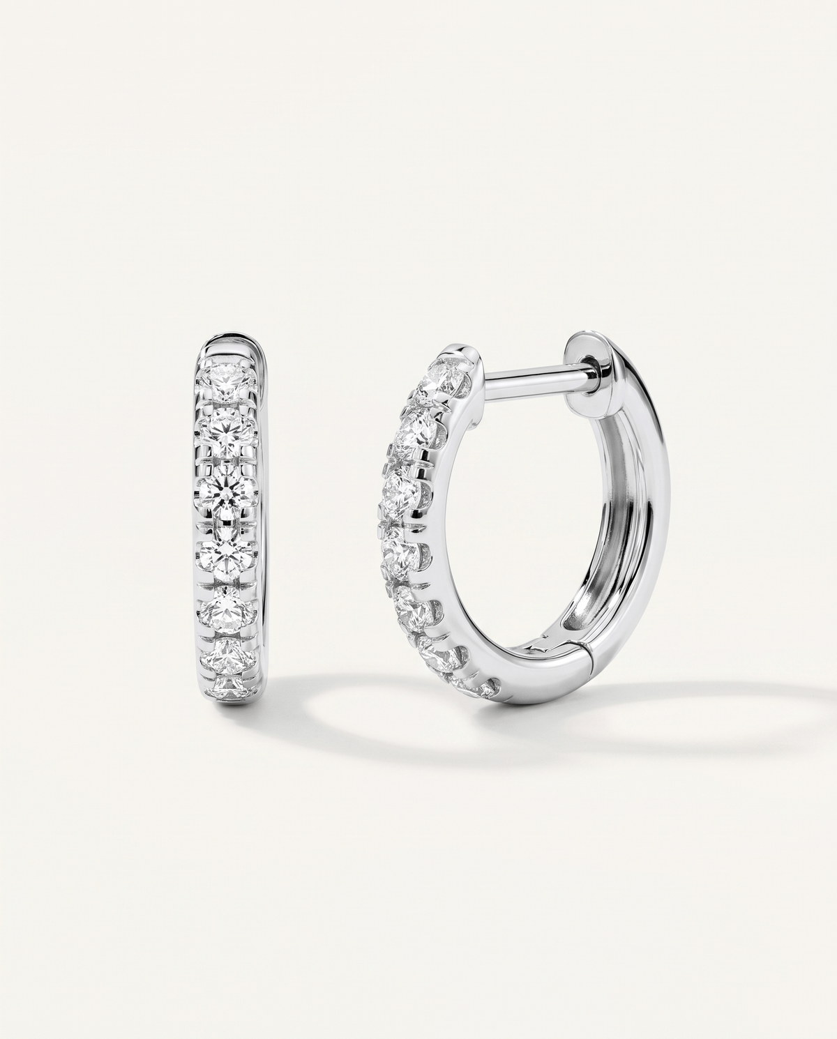 10 mm white gold lab-grown diamond huggie earrings, front and side view | MET-RE-0003