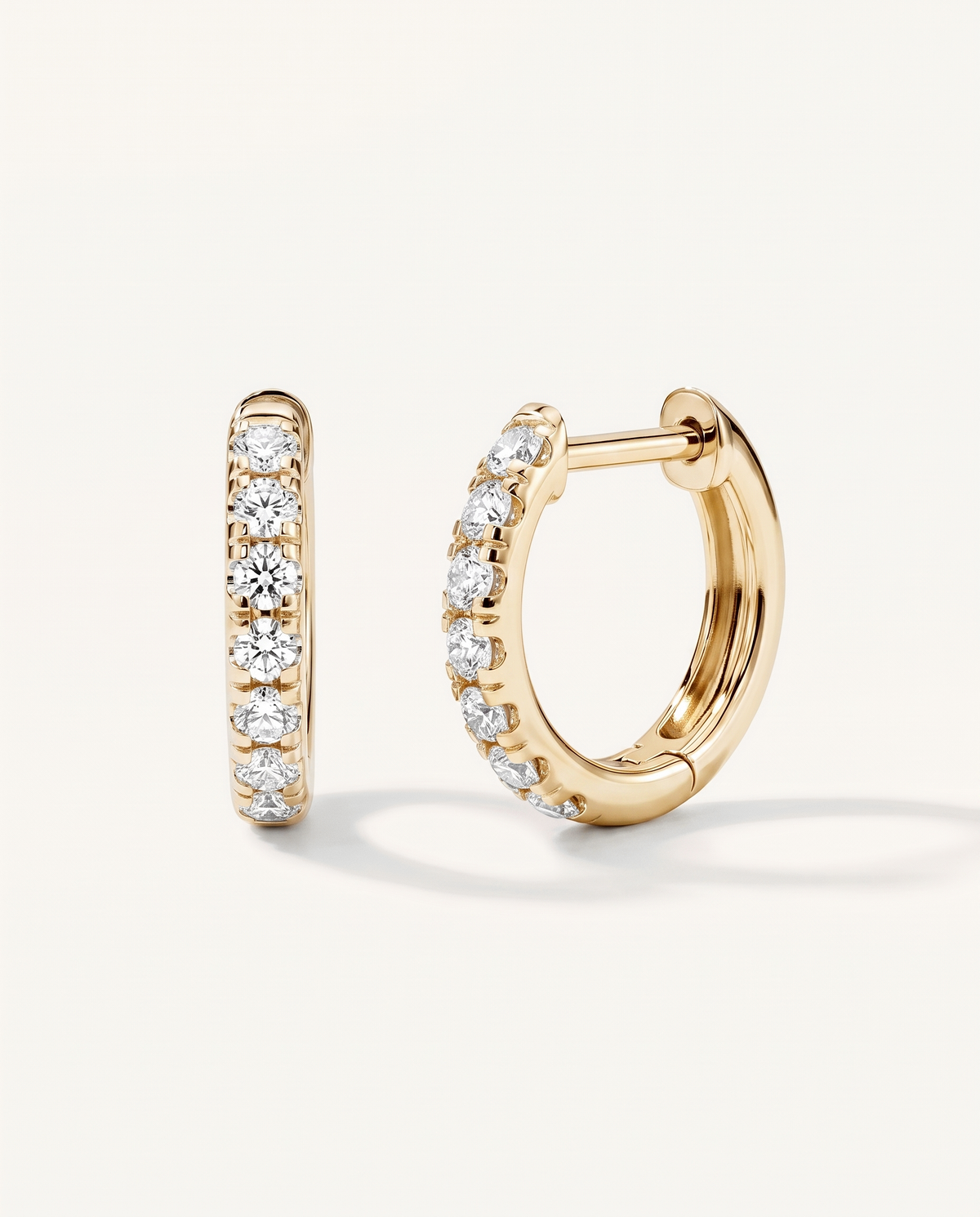 10 mm yellow gold lab-grown diamond huggie earrings, front and side view | MET-RE-0003