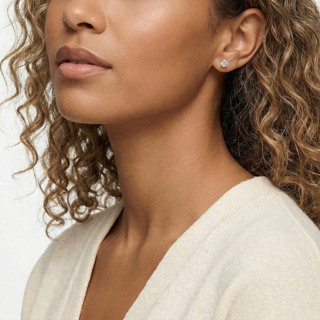 Lab-grown diamond stud earrings worn for styling; additional jewelry is not included | MET-RE-0004-M05