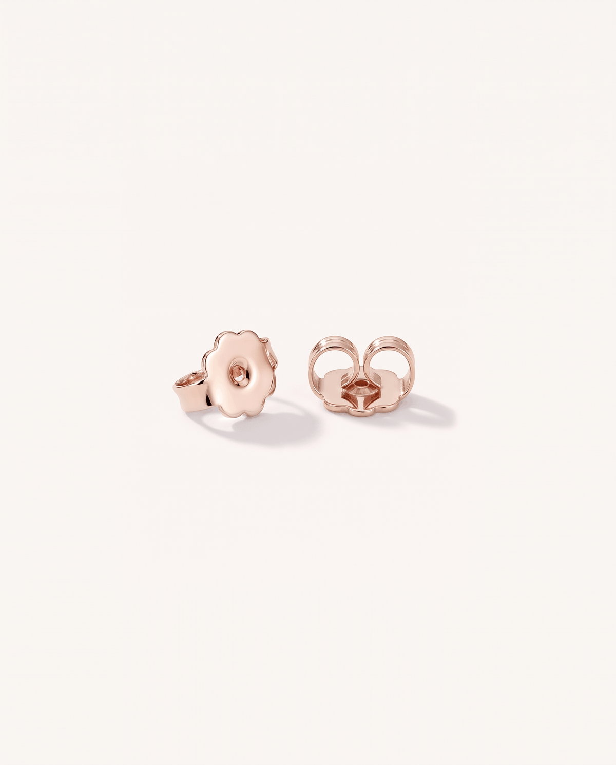 Round lab-grown diamond stud earrings in rose gold, rear view with push-back fittings | MET-RE-0004-M09