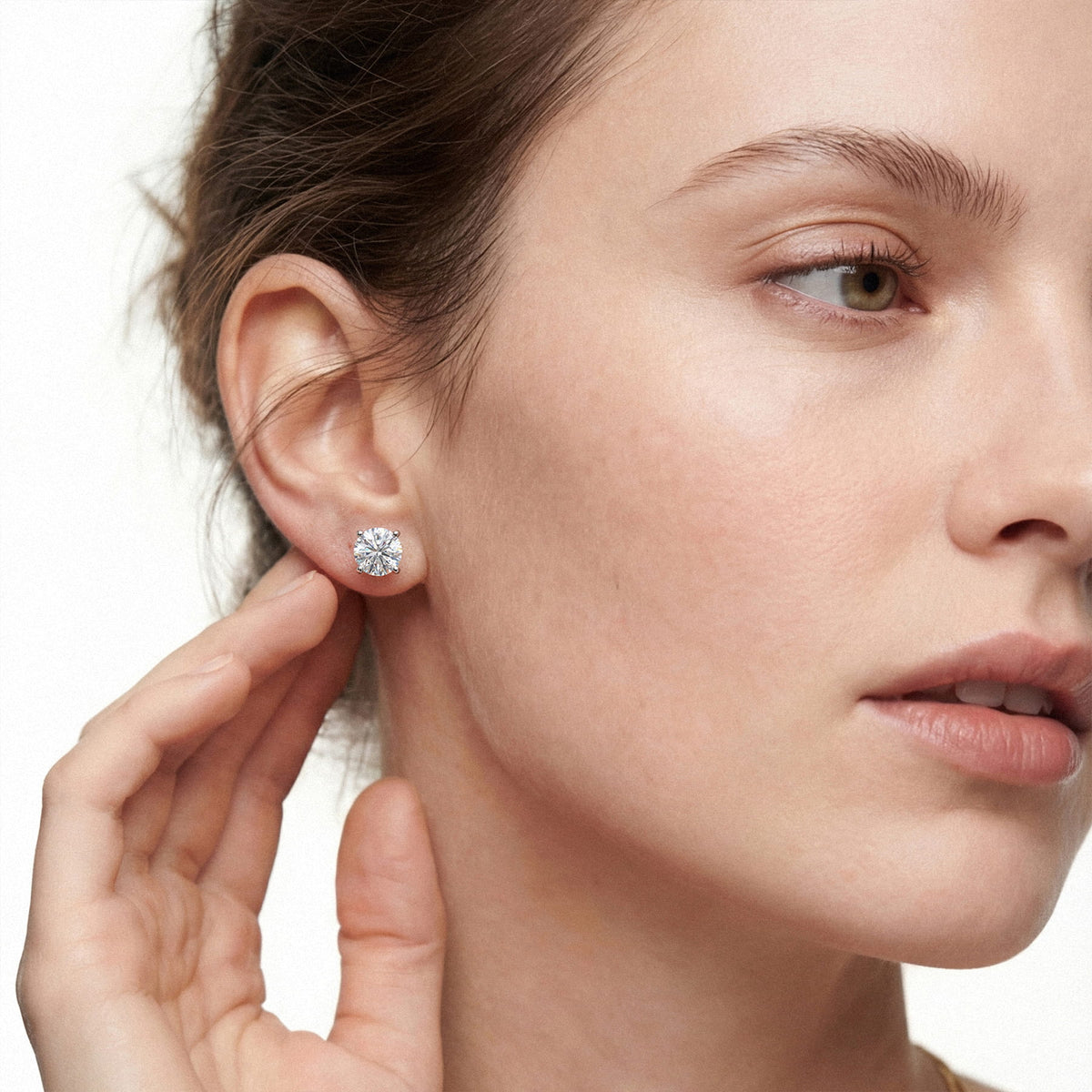 Lab-grown diamond stud earrings worn for styling; additional jewelry is not included | MET-RE-0004-M13