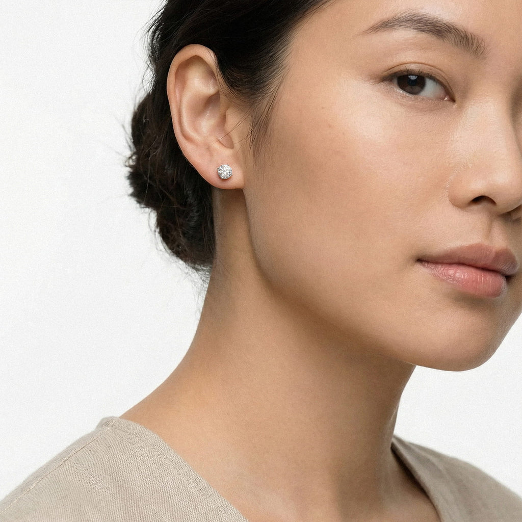 Lab-grown diamond stud earrings worn for styling; additional jewelry is not included | MET-RE-0004-M25