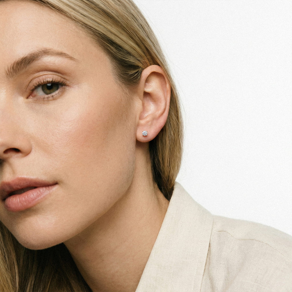 Lab-grown diamond stud earrings worn for styling; additional jewelry is not included | MET-RE-0004-M31