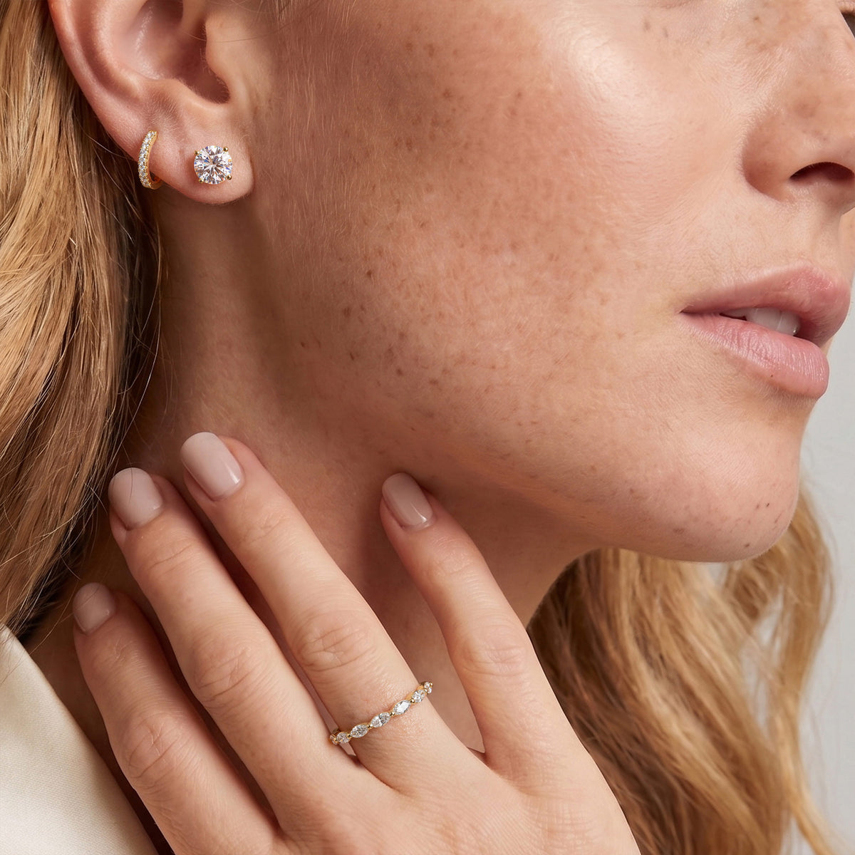 Lab-grown diamond stud earrings worn for styling; additional jewelry is not included | MET-RE-0004-M36