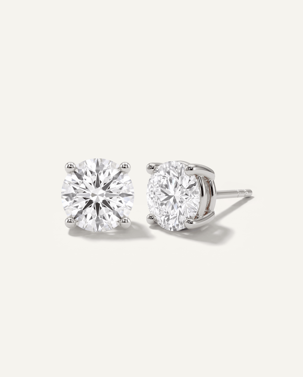 Round lab-grown diamond stud earrings in white gold, front and side view | MET-RE-0004-M39