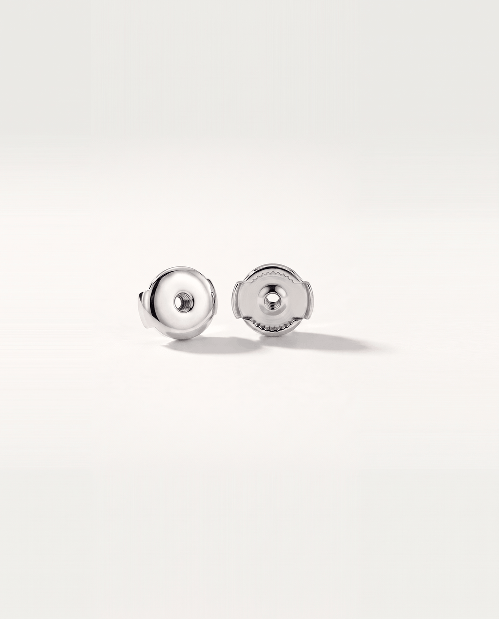 Round lab-grown diamond stud earrings in white gold, rear view with Guardian backs | MET-RE-0005-M04