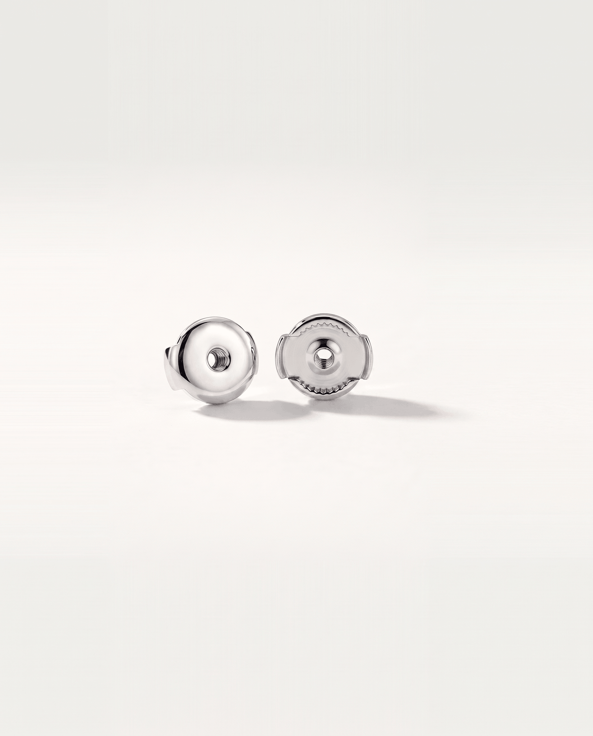 Round lab-grown diamond stud earrings in white gold, rear view with Guardian backs | MET-RE-0005-M04