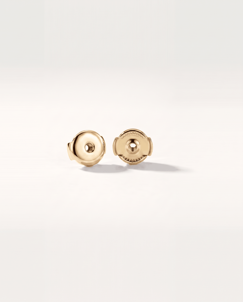 Round lab-grown diamond stud earrings in yellow gold, rear view with Guardian backs | MET-RE-0005-M07