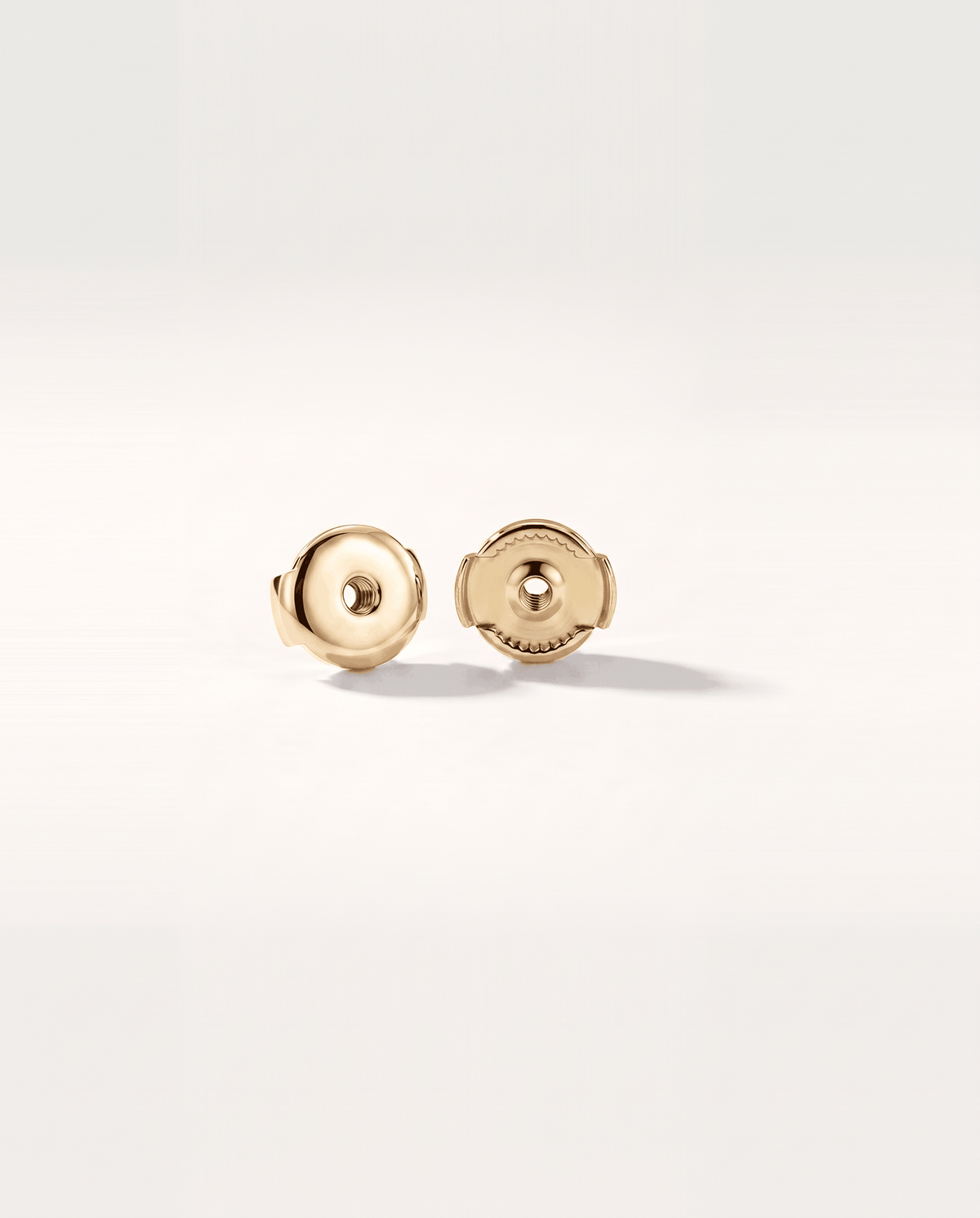 Round lab-grown diamond stud earrings in yellow gold, rear view with Guardian backs | MET-RE-0005-M07