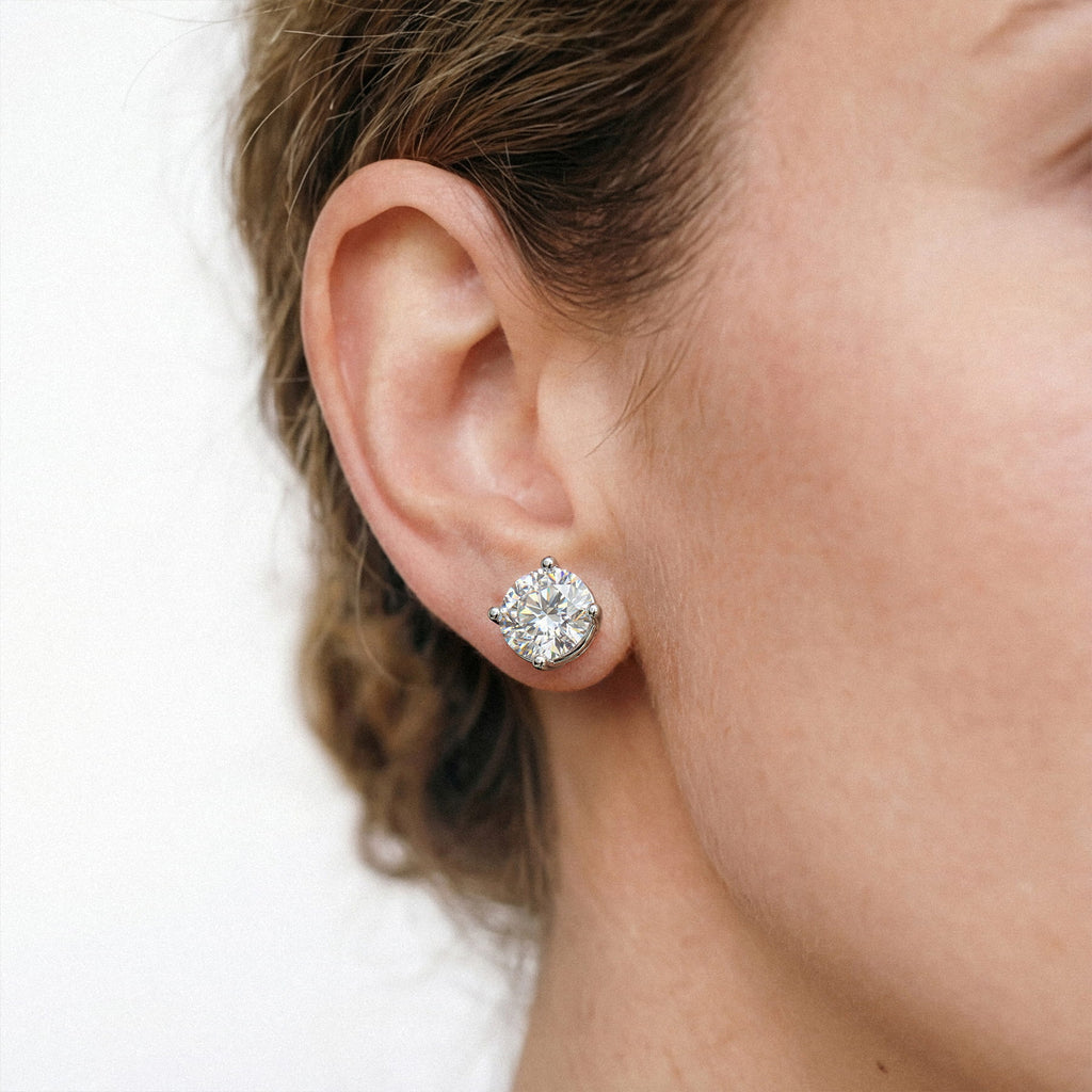 Lab-grown diamond stud earrings worn for styling; additional jewelry is not included | MET-RE-0005-M27
