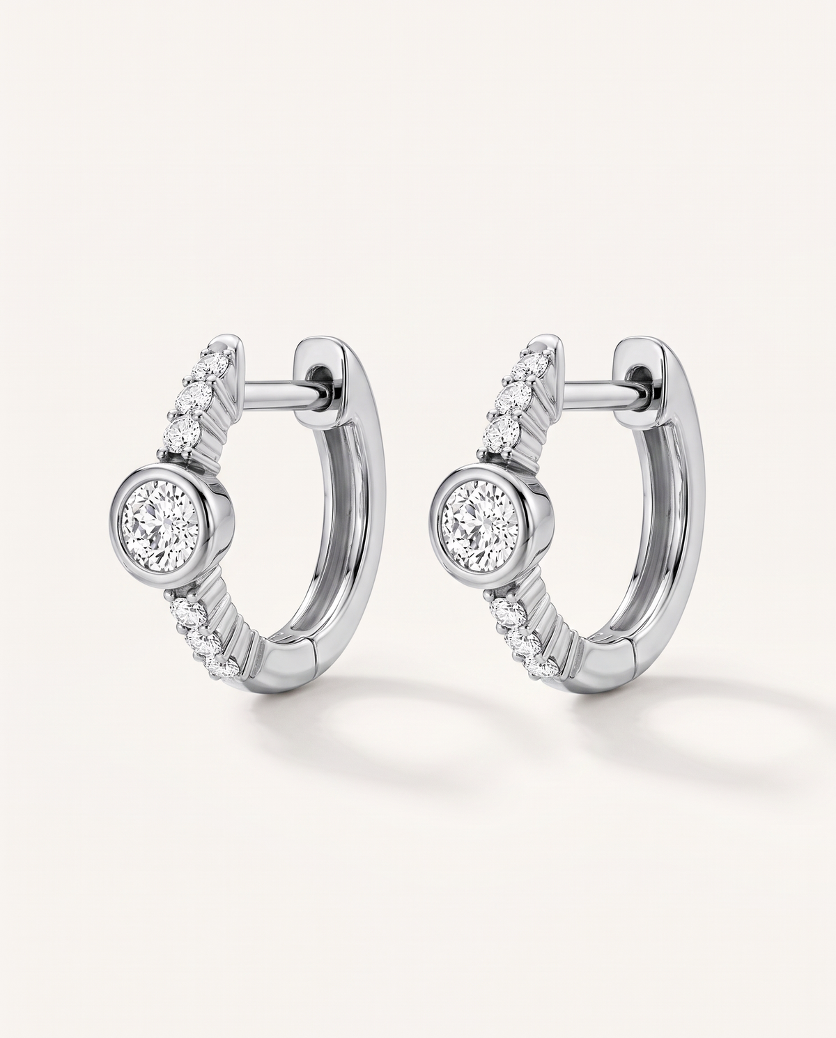 Bezel and Pavé Lab-Grown Diamond Huggie Earrings in white gold, view 3 | MET-RE-0017-M03