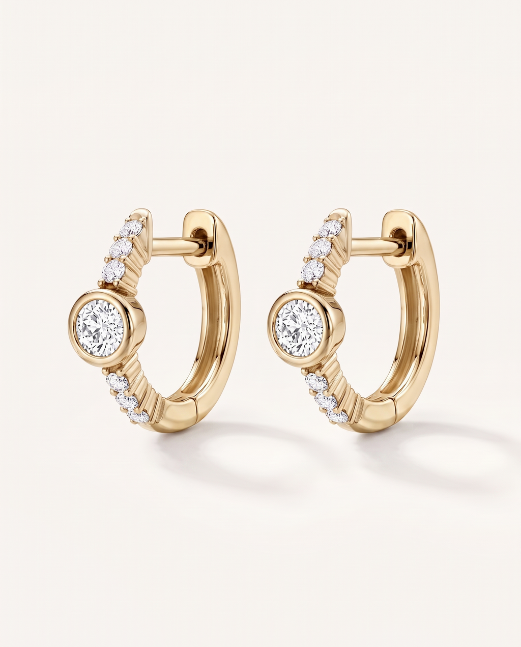 Bezel and Pavé Lab-Grown Diamond Huggie Earrings in yellow gold, view 3 | MET-RE-0017-M05