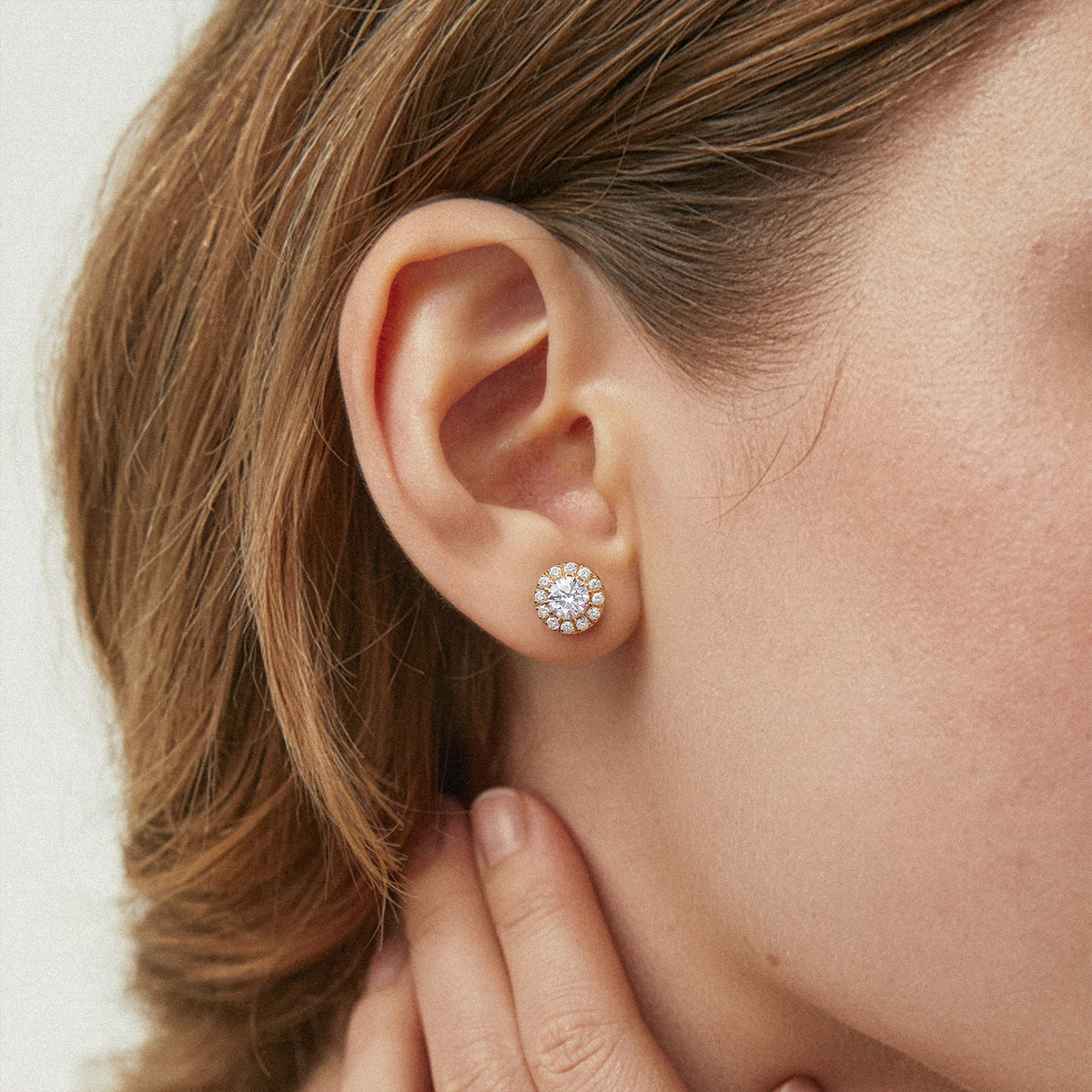 Round Halo Lab-Grown Diamond Stud Earrings worn for styling | MET-RE-0022-M07