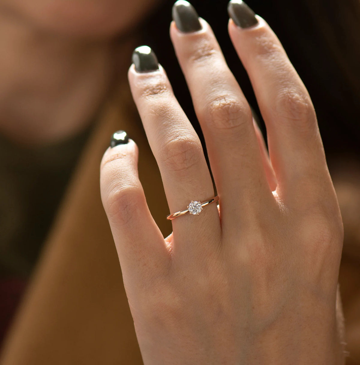 First Light ring in yellow gold — lifestyle front