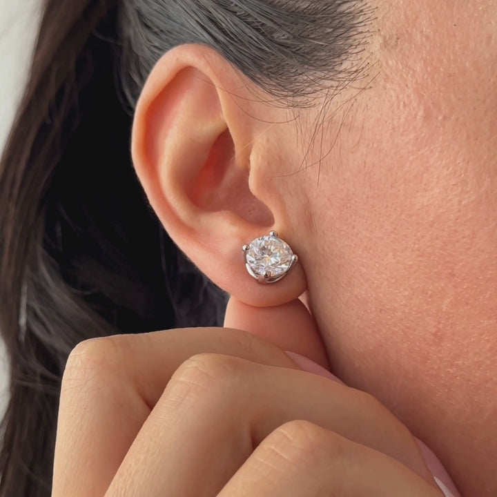 Lab-grown diamond stud earrings worn for styling; additional jewelry is not included | MET-RE-0005-M23