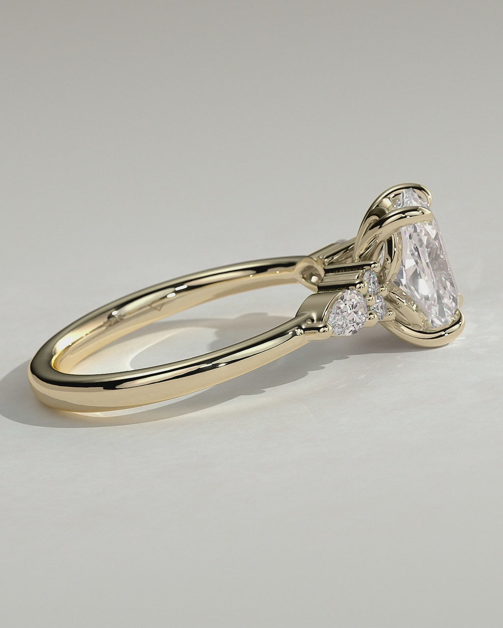 MET 0067 Elongated Cushion Three Stone Engagement Ring