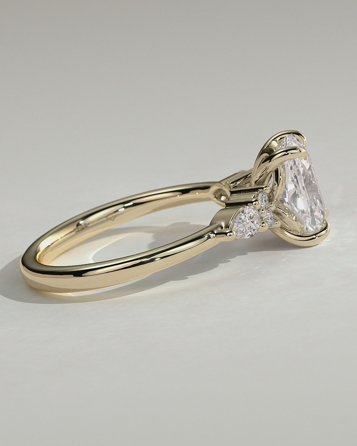 MET 0067 Elongated Cushion Three Stone Engagement Ring